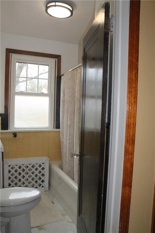 67 Warren Street Pittsburgh, PA 15205 - Photo 30 of 39 a bathroom with a bathtub and a shower
