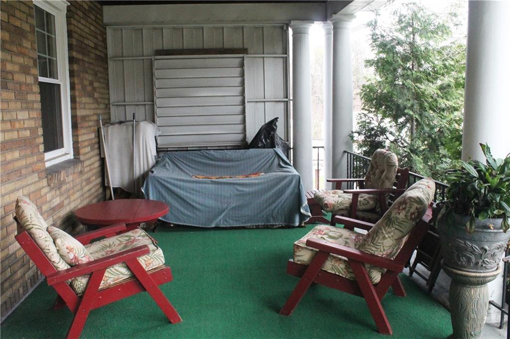 67 Warren Street Pittsburgh, PA 15205 - Photo 3 of 39 a backyard of a house with table and chairs