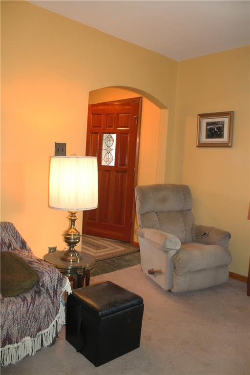 67 Warren Street Pittsburgh, PA 15205 - Photo 36 of 39 a living room with furniture and a lamp