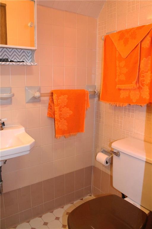 67 Warren Street Pittsburgh, PA 15205 - Photo 38 of 39 a bathroom with a sink and a toilet