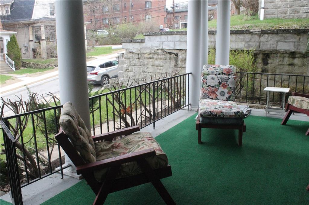 67 Warren Street Pittsburgh, PA 15205 - Photo 4 of 39 a view of a porch with furniture