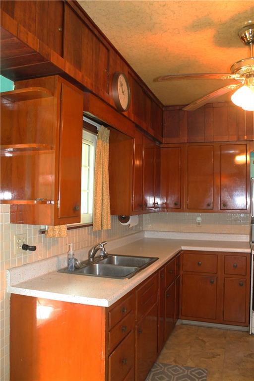 67 Warren Street Pittsburgh, PA 15205 - Photo 5 of 39 a kitchen with a sink and a stove top oven