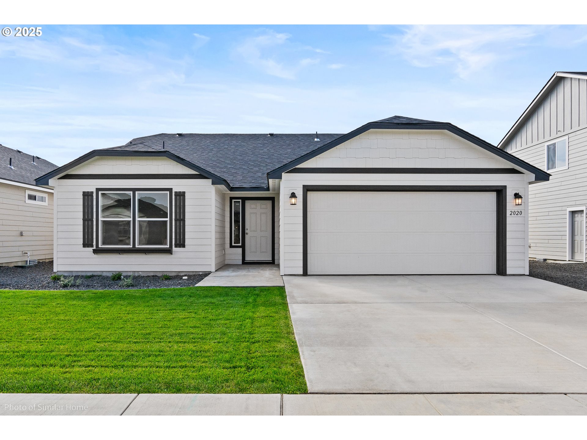 5104 Holly Street Springfield, OR 97478 - Photo 1 of 1 a front view of a house with a yard
