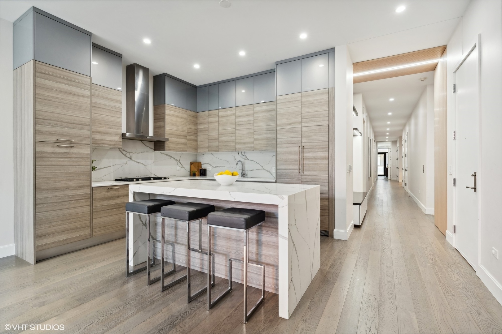 27 North Aberdeen Street, Unit 3N Chicago, IL 60607 - Photo 11 of 35 a kitchen with stainless steel appliances a sink stove and cabinets