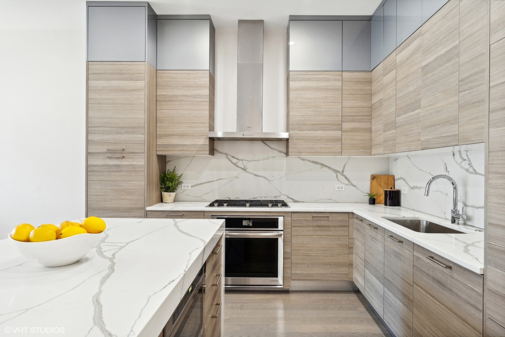 27 North Aberdeen Street, Unit 3N Chicago, IL 60607 - Photo 13 of 35 a kitchen with a sink stove and cabinets