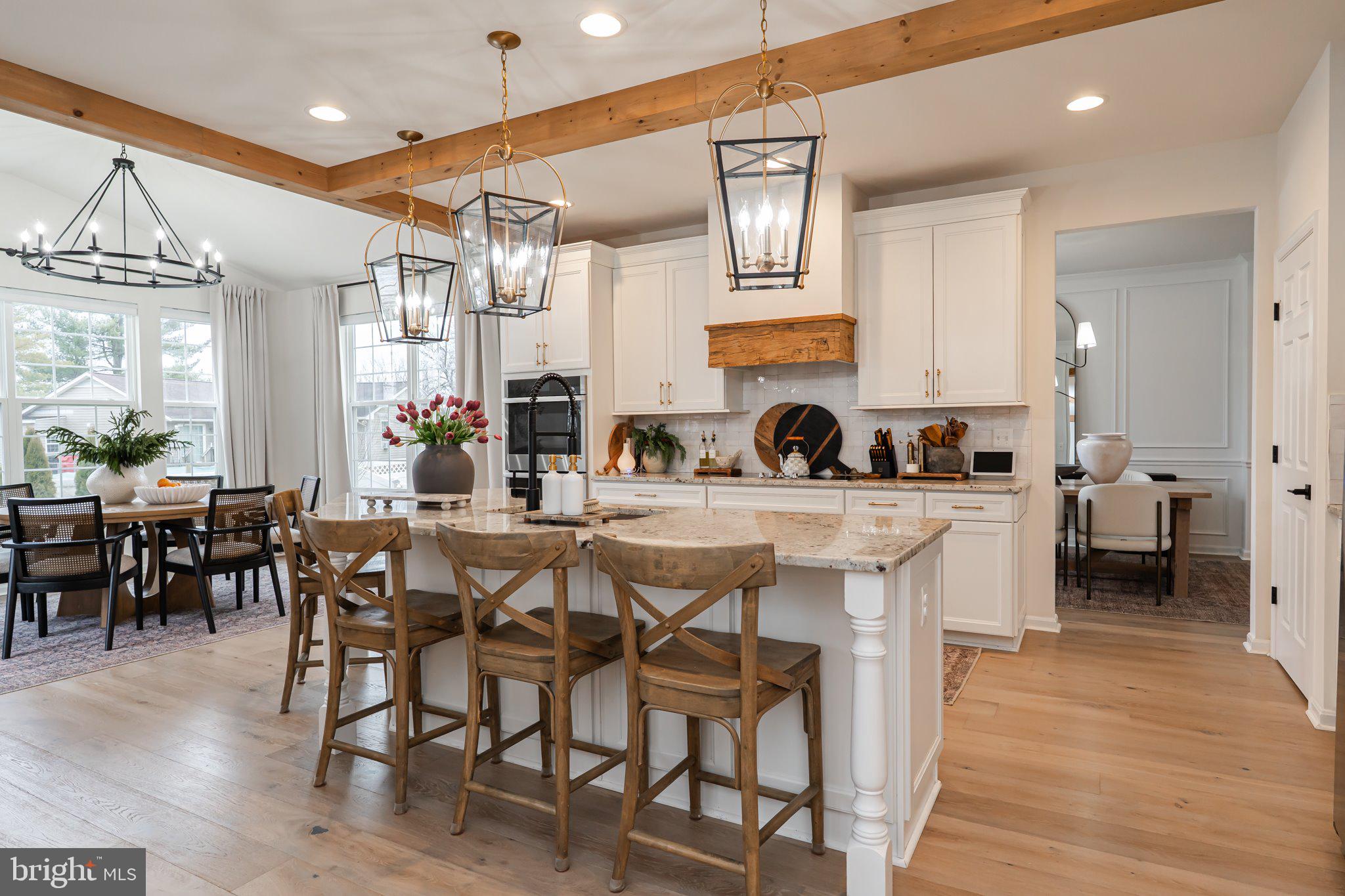 38 Deep Creek Road Ranson, WV 25438 - Photo 11 of 64 a view of a dining room with furniture and wooden floor