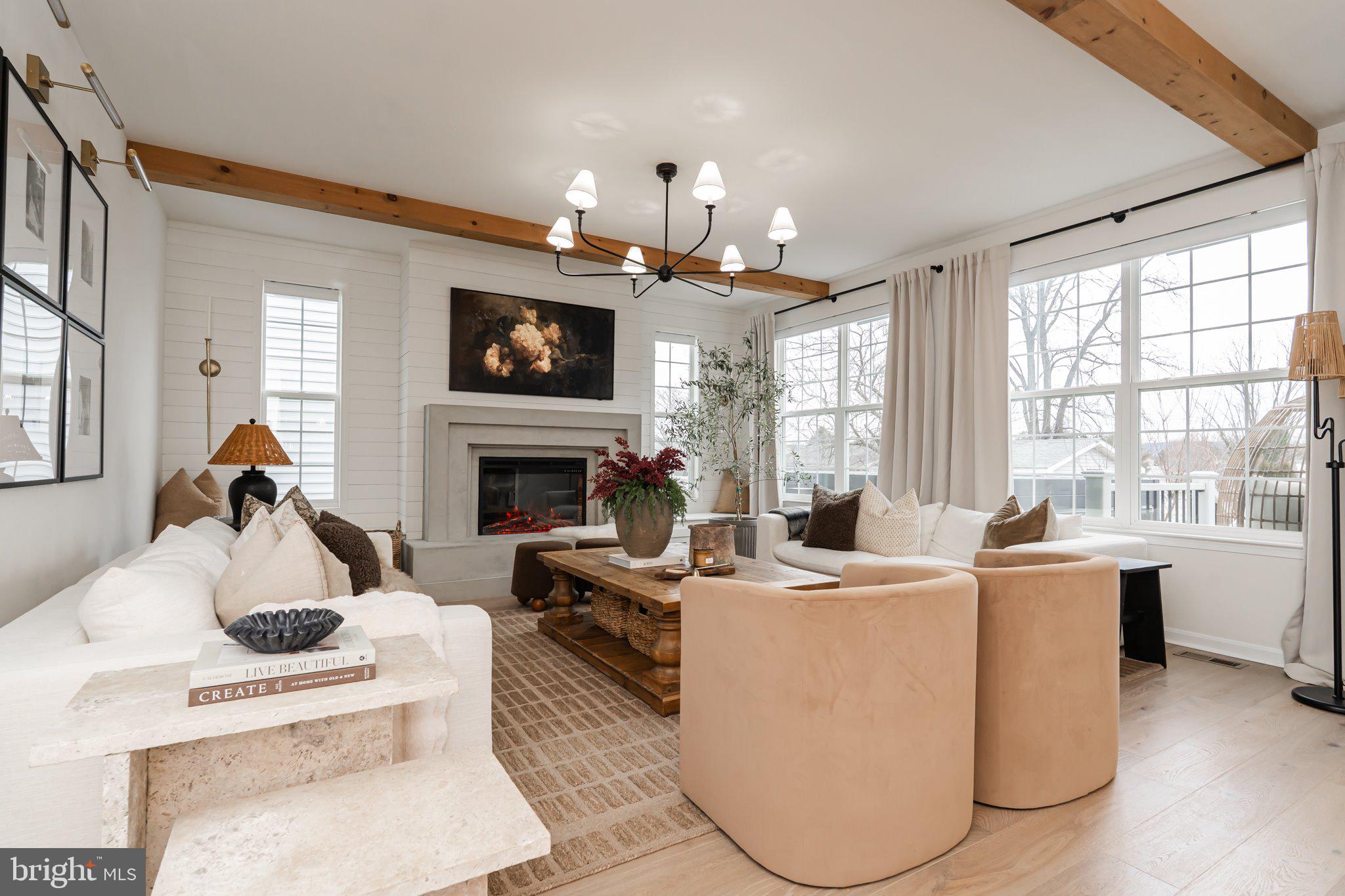 38 Deep Creek Road Ranson, WV 25438 - Photo 13 of 64 a living room with furniture a fireplace and a flat screen tv