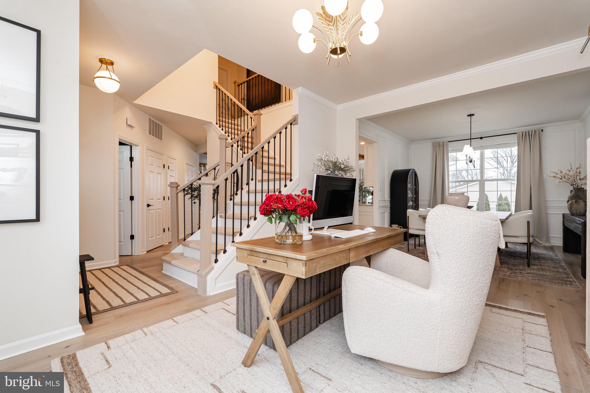 38 Deep Creek Road Ranson, WV 25438 - Photo 17 of 64 a living room with furniture a dining table and a fireplace