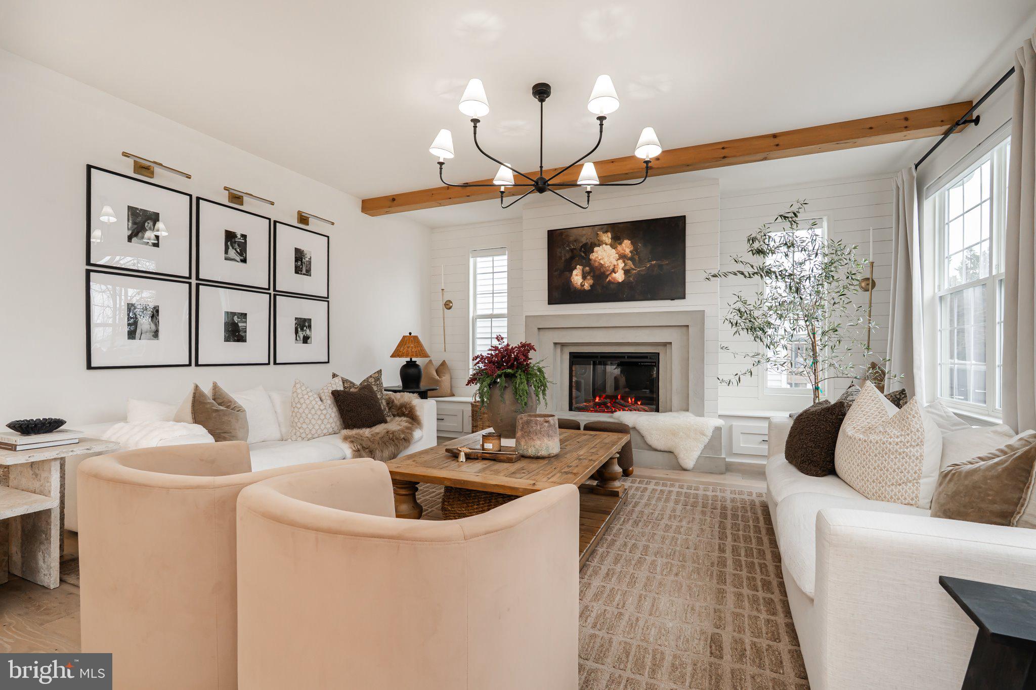 38 Deep Creek Road Ranson, WV 25438 - Photo 19 of 64 a living room with furniture a fireplace and a flat screen tv