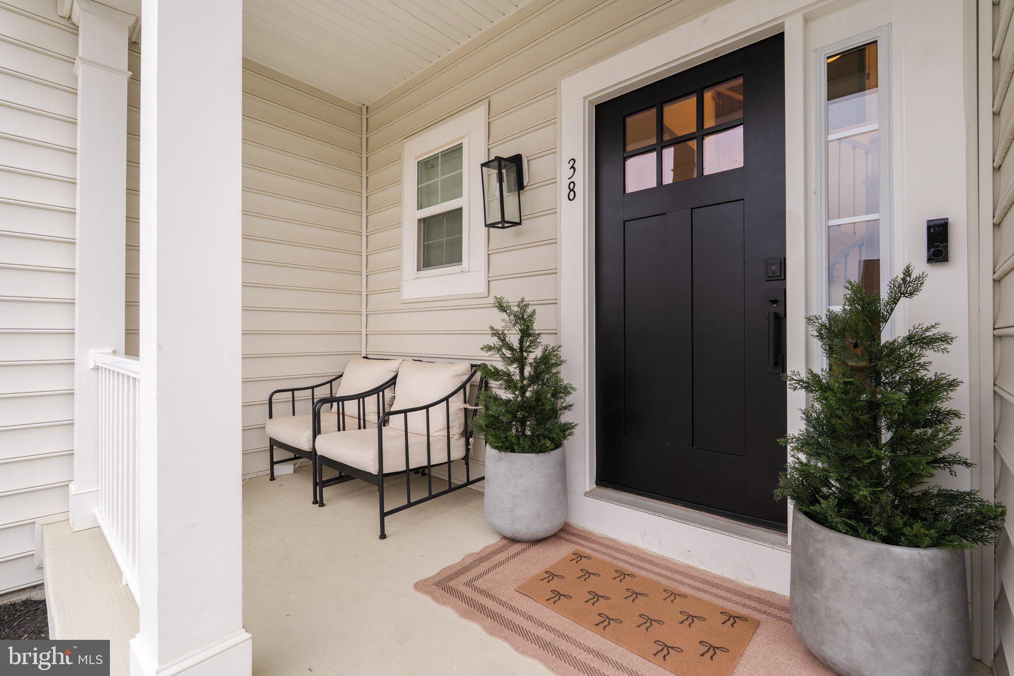 38 Deep Creek Road Ranson, WV 25438 - Photo 2 of 64 a view of a bench in front of house