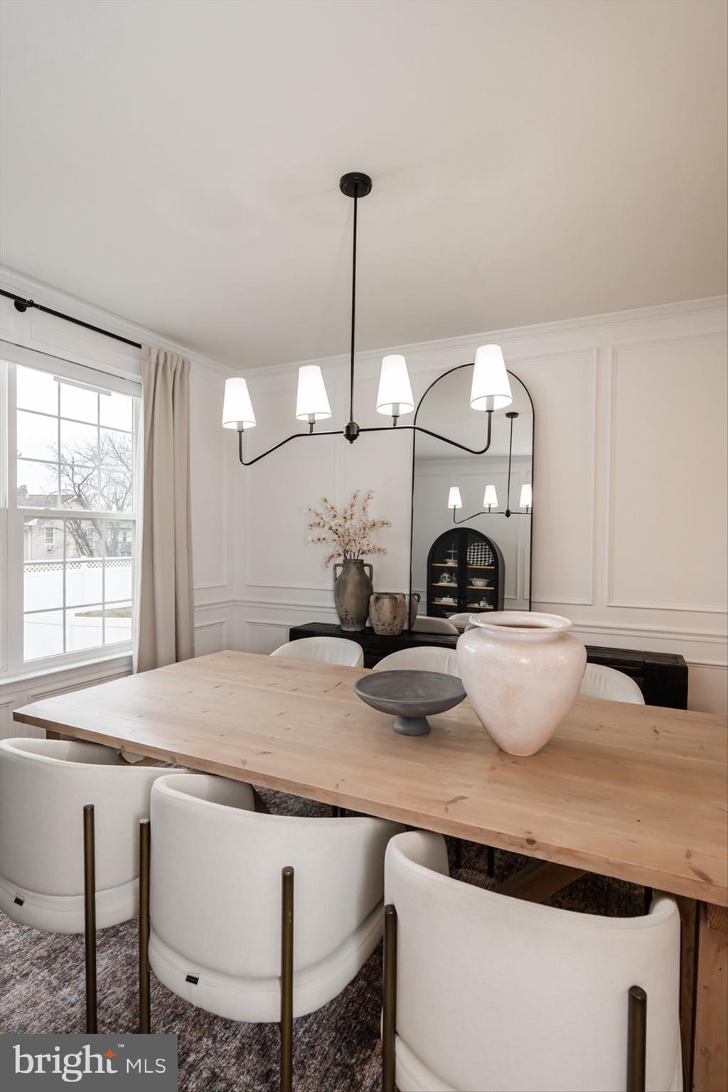 38 Deep Creek Road Ranson, WV 25438 - Photo 28 of 64 a kitchen with a table chairs and a chandelier