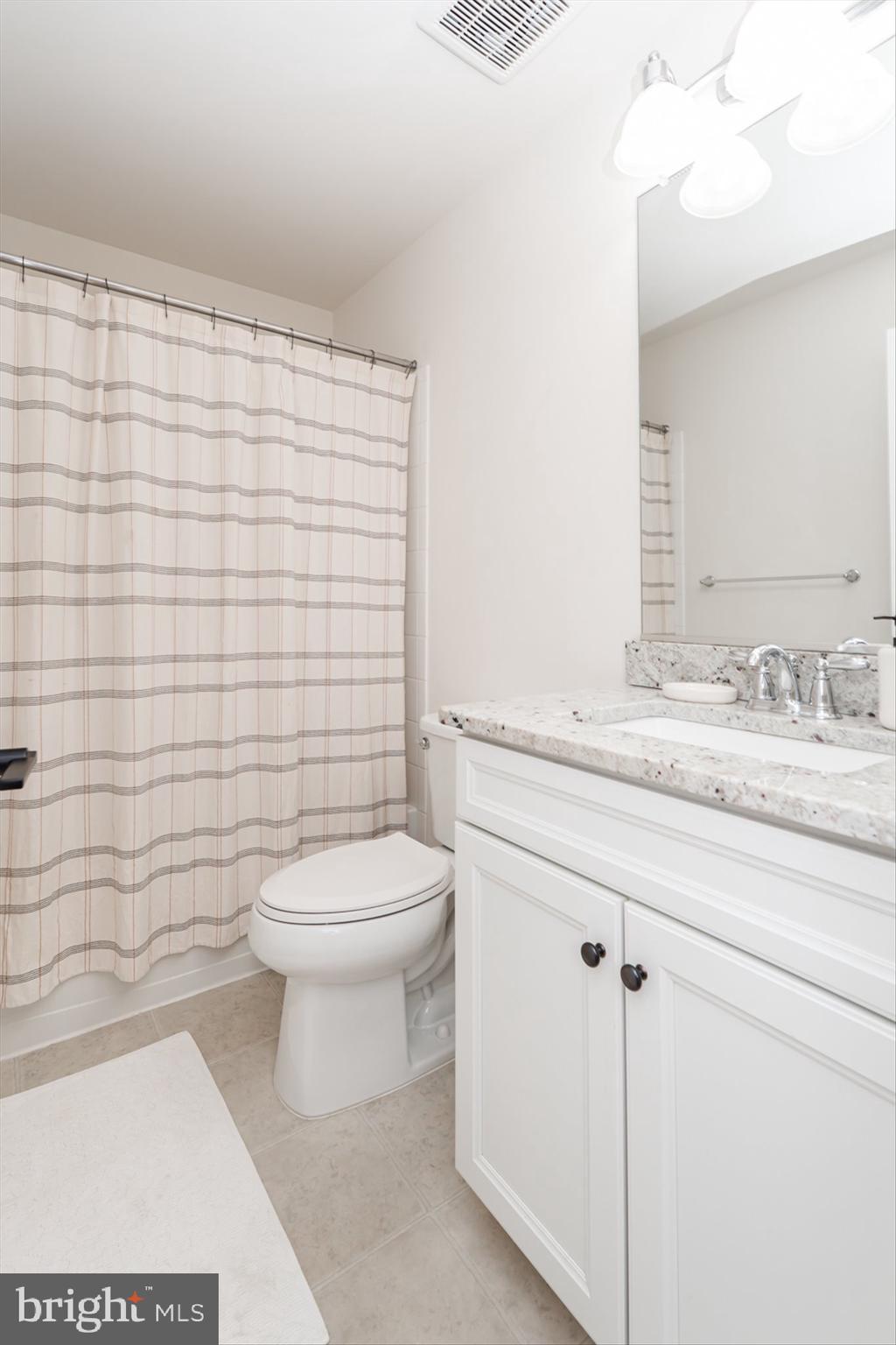 38 Deep Creek Road Ranson, WV 25438 - Photo 43 of 64 a bathroom with a toilet a sink and a shower