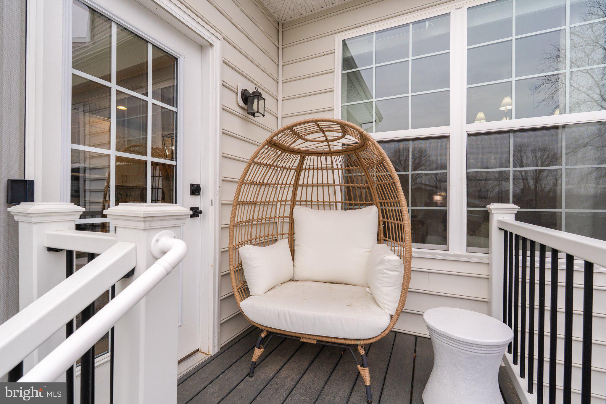 38 Deep Creek Road Ranson, WV 25438 - Photo 57 of 64 a view of a balcony with table and chairs