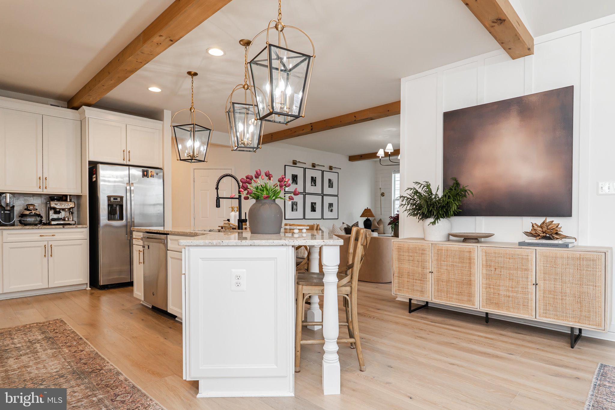 38 Deep Creek Road Ranson, WV 25438 - Photo 7 of 64 a kitchen with white cabinets and stainless steel appliances