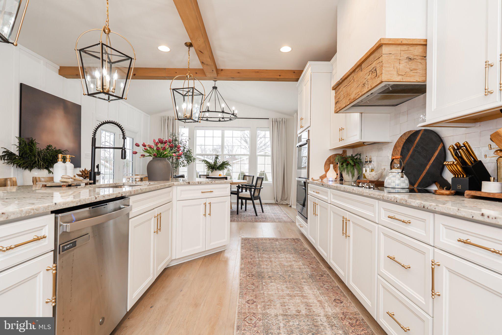 38 Deep Creek Road Ranson, WV 25438 - Photo 9 of 64 a kitchen with counter top space a sink cabinets and appliances