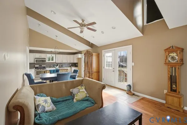 a living room with furniture and a table