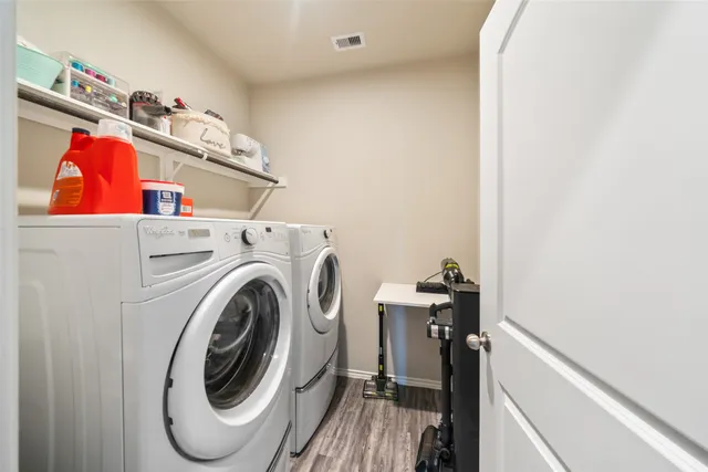 a utility room with dryer and washer