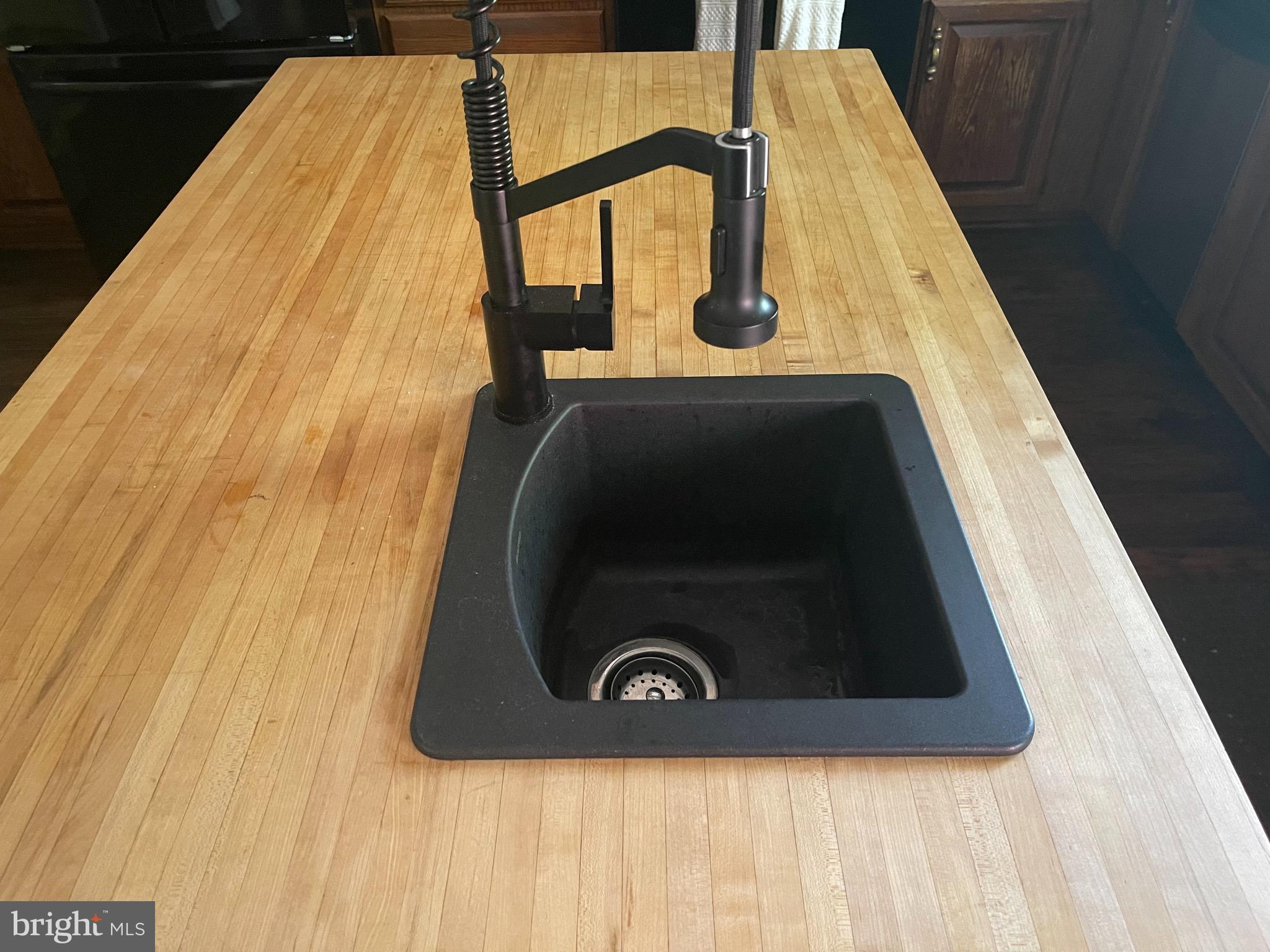 6180 Evergreen Mountain Road Broad Run, VA 20137 - Photo 6 of 23 Prep sink has been added to Kitchen Island