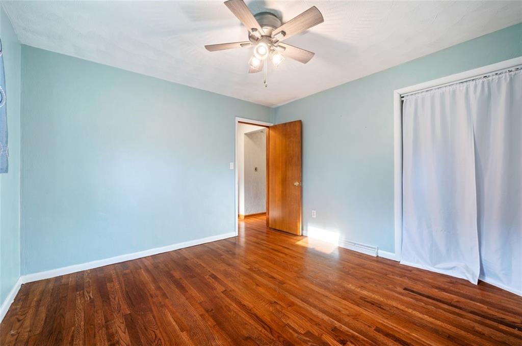 2425 Highway 30 Hookstown, PA 15050 - Photo 15 of 28 a view of an empty room with window and wooden floor