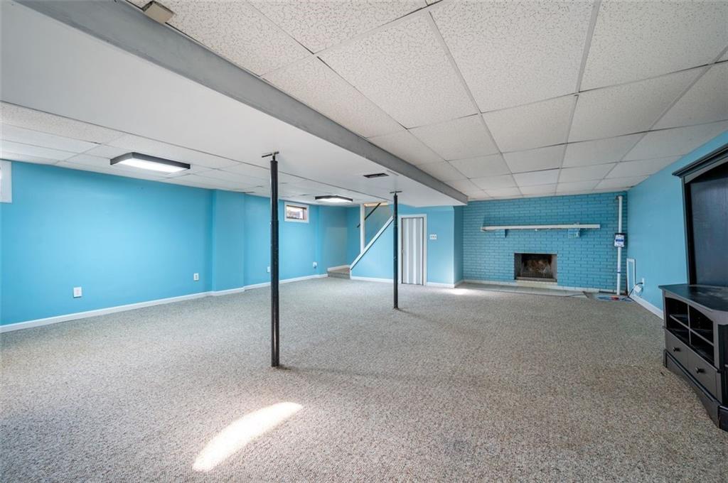 2425 Highway 30 Hookstown, PA 15050 - Photo 19 of 28 a view of a livingroom with a fireplace and window