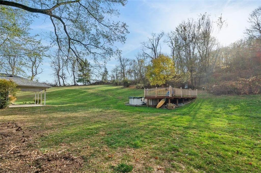2425 Highway 30 Hookstown, PA 15050 - Photo 25 of 28 a backyard of a house with table and chairs