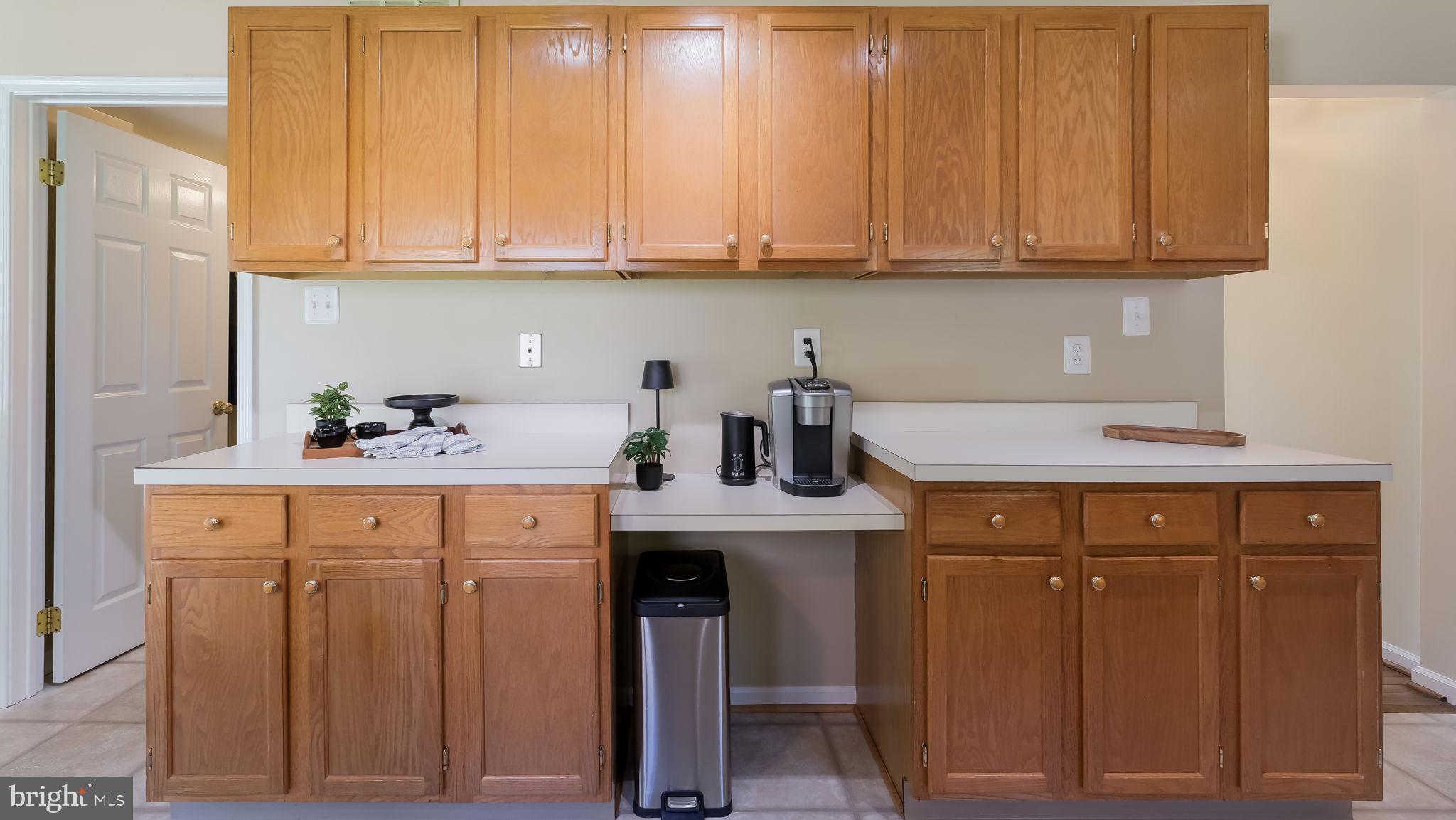 9 Caldwell Circle Newtown, PA 18940 - Photo 12 of 29 a kitchen with stainless steel appliances granite countertop a sink dishwasher cabinets and granite countertops with wooden floor