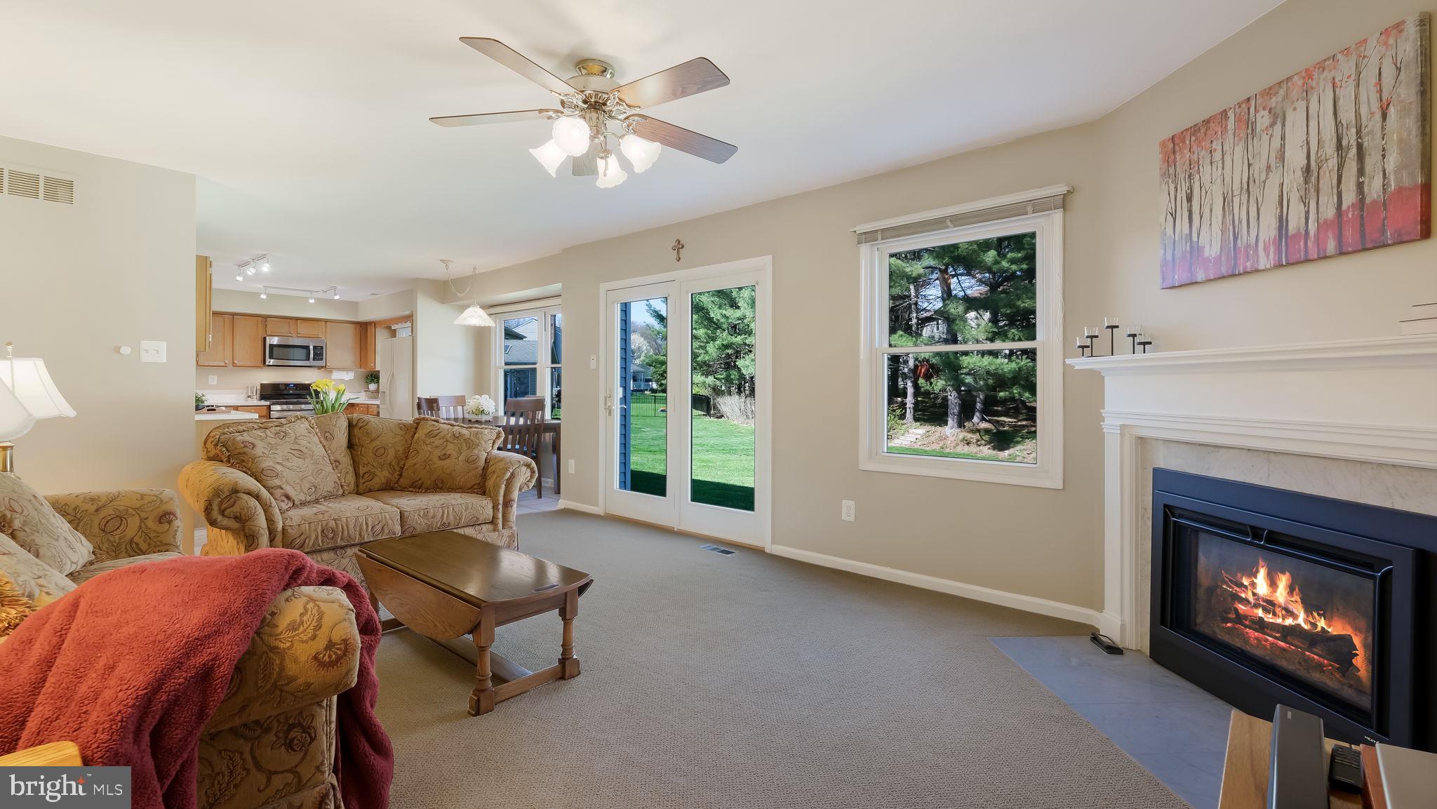 9 Caldwell Circle Newtown, PA 18940 - Photo 14 of 29 a living room with furniture and a fireplace