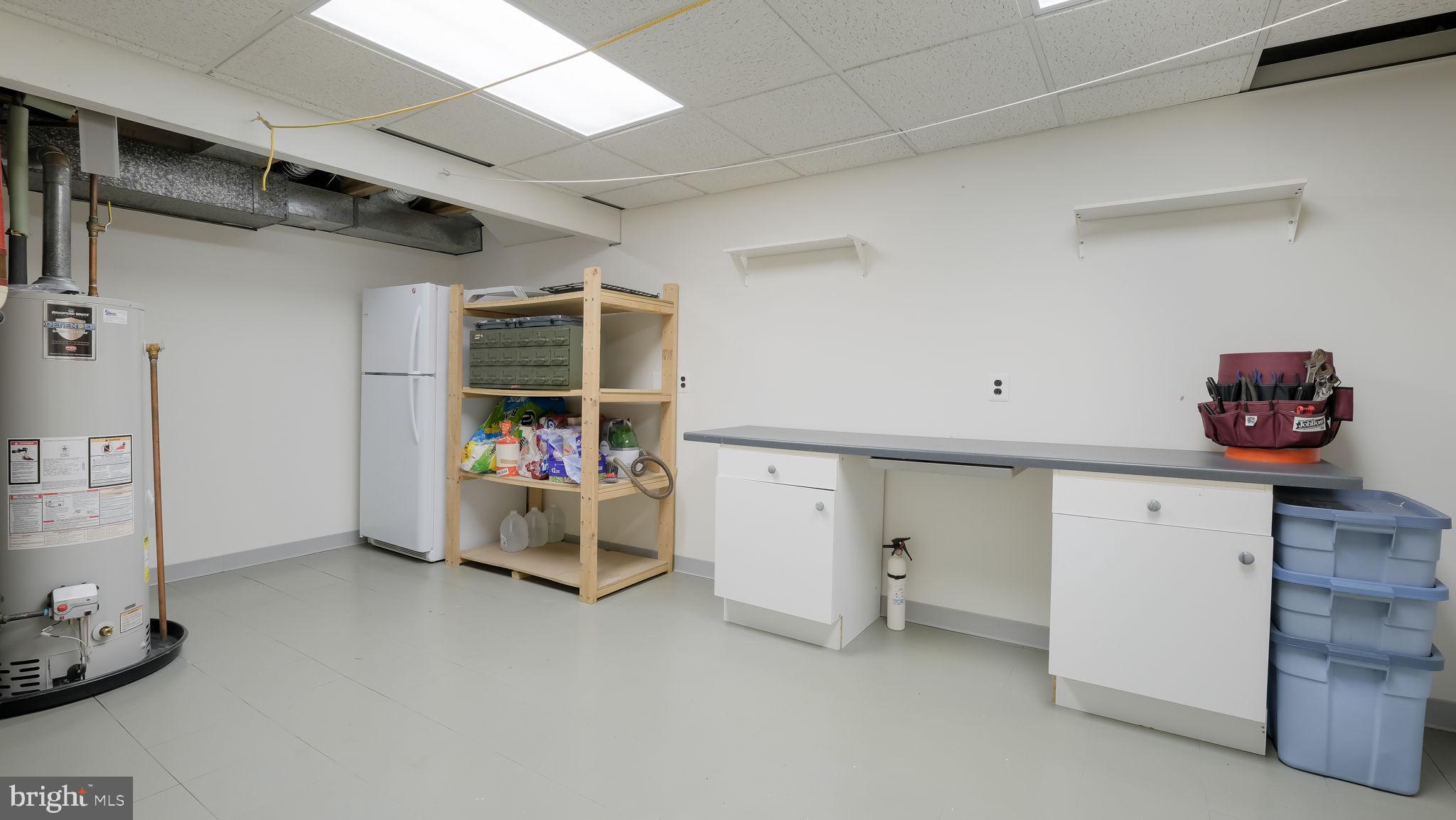 9 Caldwell Circle Newtown, PA 18940 - Photo 27 of 29 a view of a storage & utility room with two washing machine