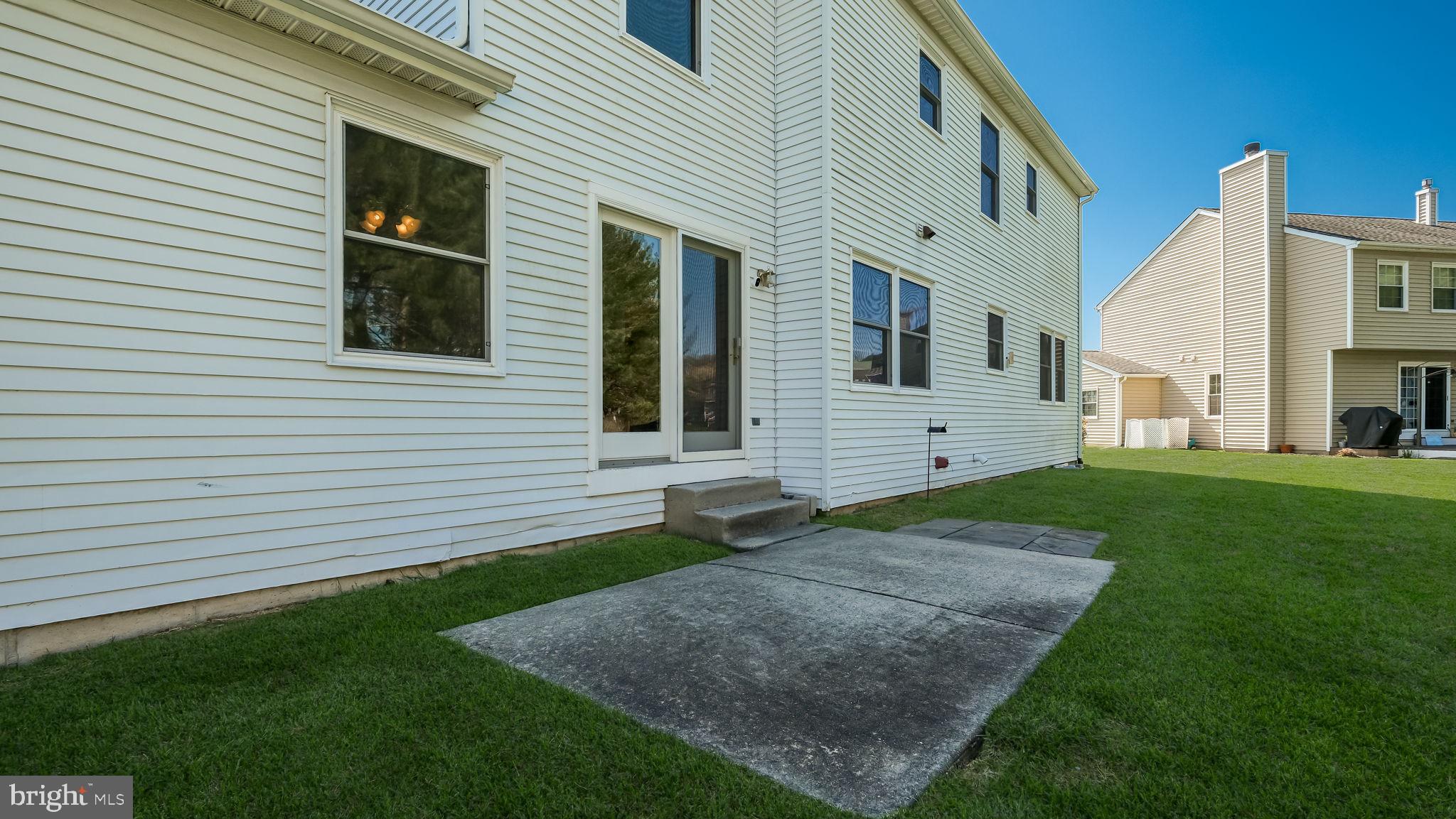 9 Caldwell Circle Newtown, PA 18940 - Photo 29 of 29 a view of a white house next to a yard