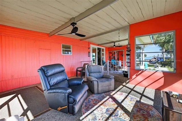 a outdoor living space with patio furniture and a potted plant