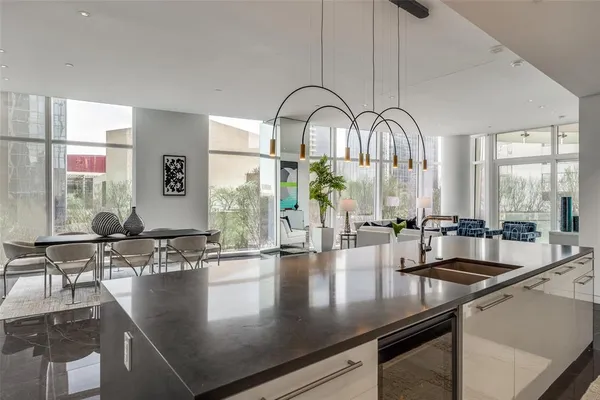 a view of kitchen island with stainless steel appliances