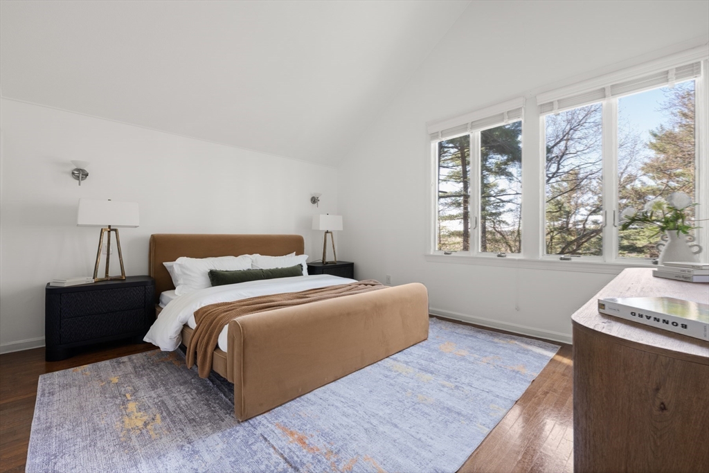 40 Hobbs Brook Road Weston, MA 02493 - Photo 27 of 42 a bedroom with bed and wooden floor