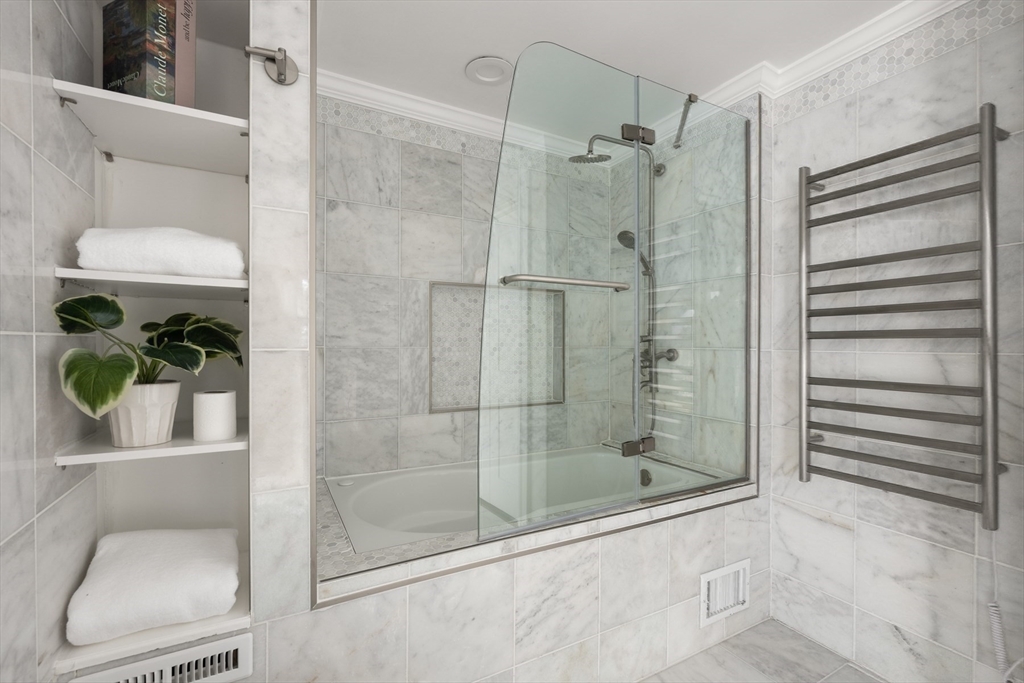 40 Hobbs Brook Road Weston, MA 02493 - Photo 30 of 42 a bathroom with a shower and a toilet