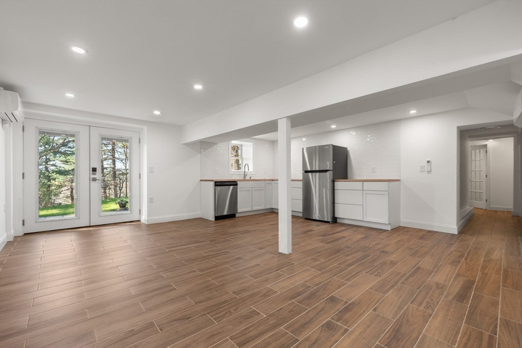 40 Hobbs Brook Road Weston, MA 02493 - Photo 32 of 42 a view of kitchen with furniture and wooden floor