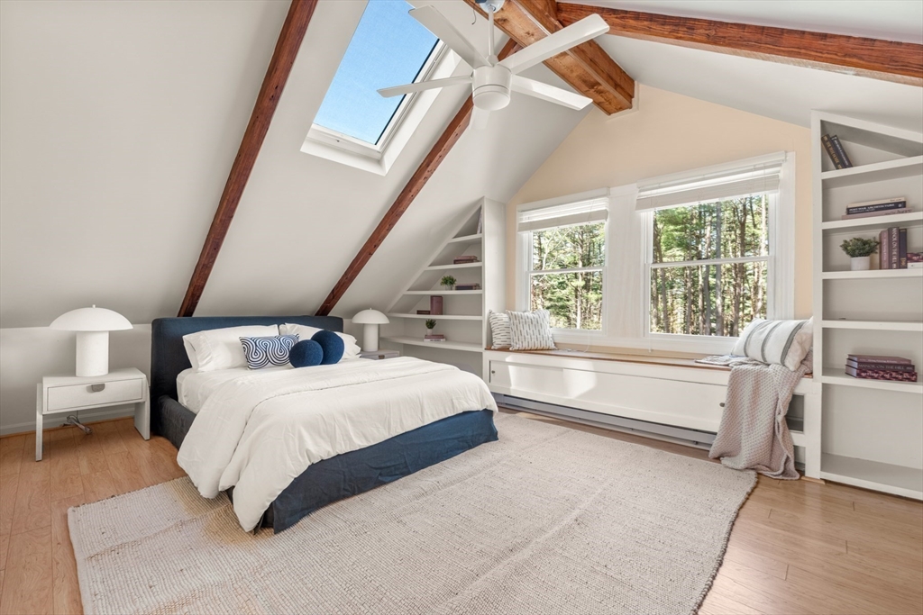 40 Hobbs Brook Road Weston, MA 02493 - Photo 39 of 42 a spacious bedroom with a bed and a large window