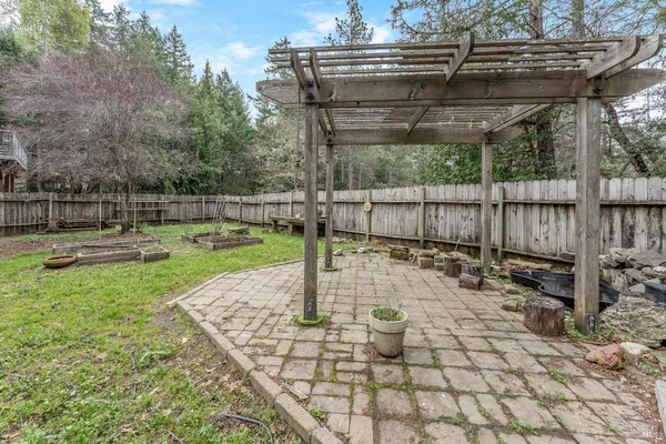 a view of a swimming pool with a patio