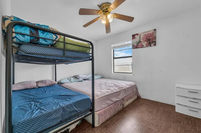a bedroom with a bed and a cabinets