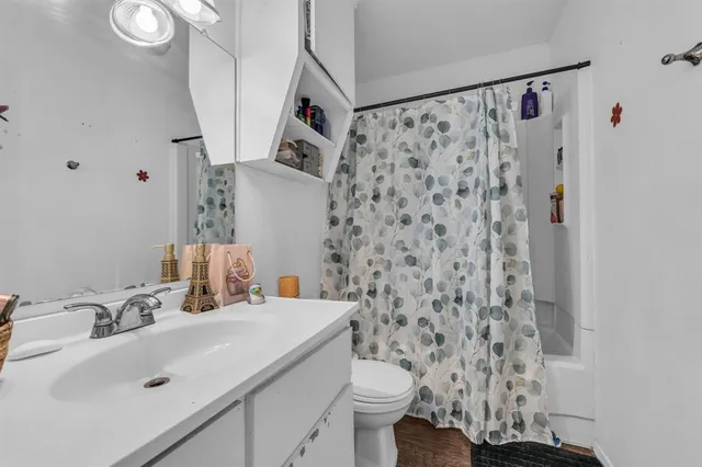 a view of a swimming pool with a yard