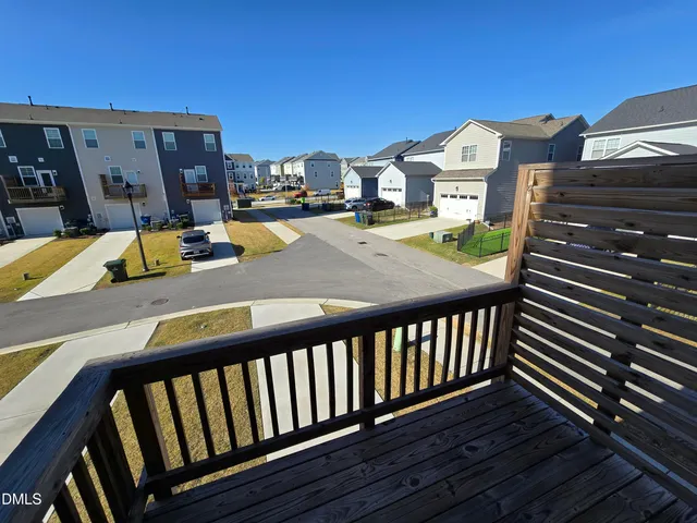a view of a balcony with an outdoor space