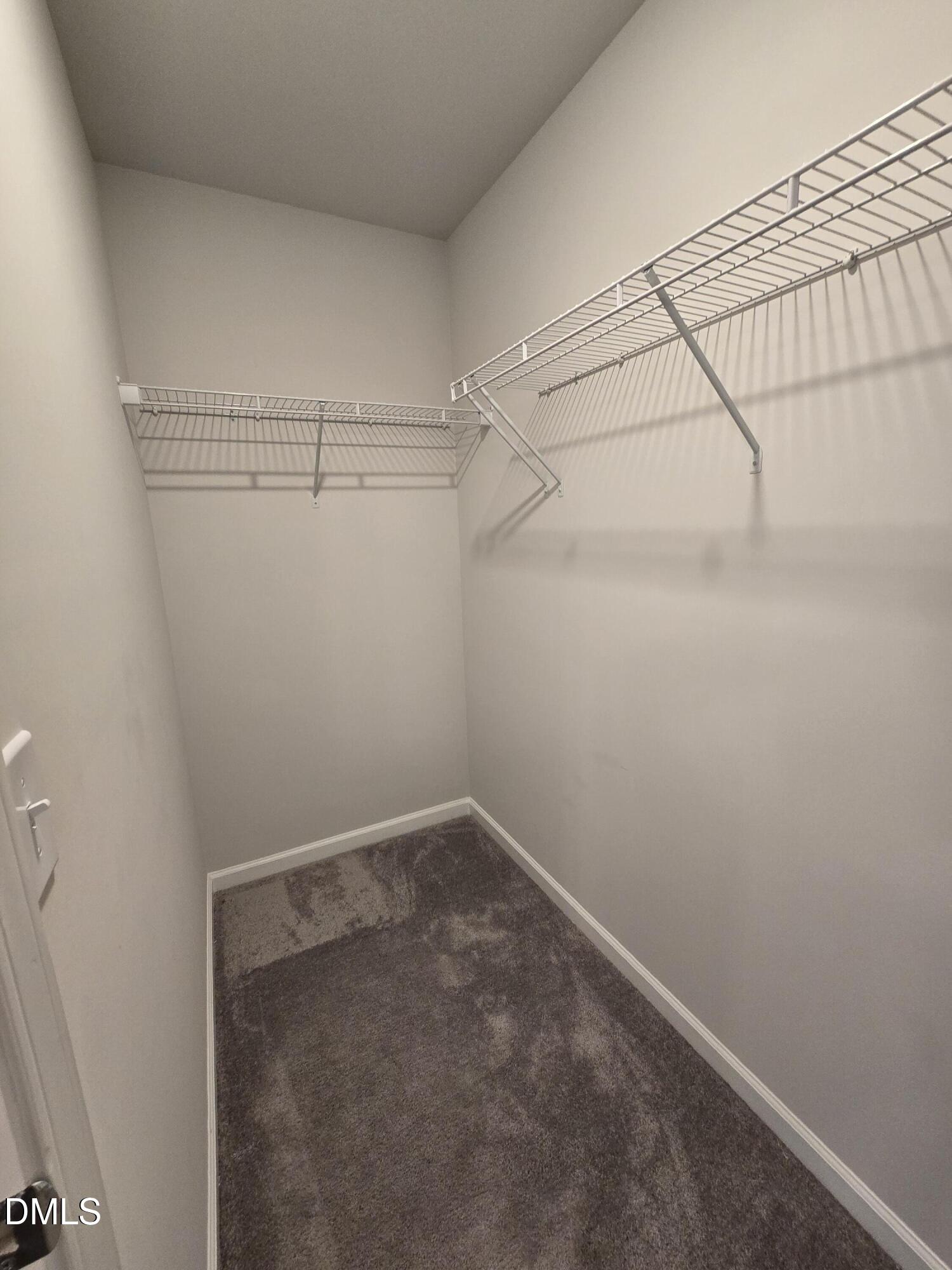 6309 Truxton Lane Raleigh, NC 27616 - Photo 33 of 41 a view of a room with racks on the wall