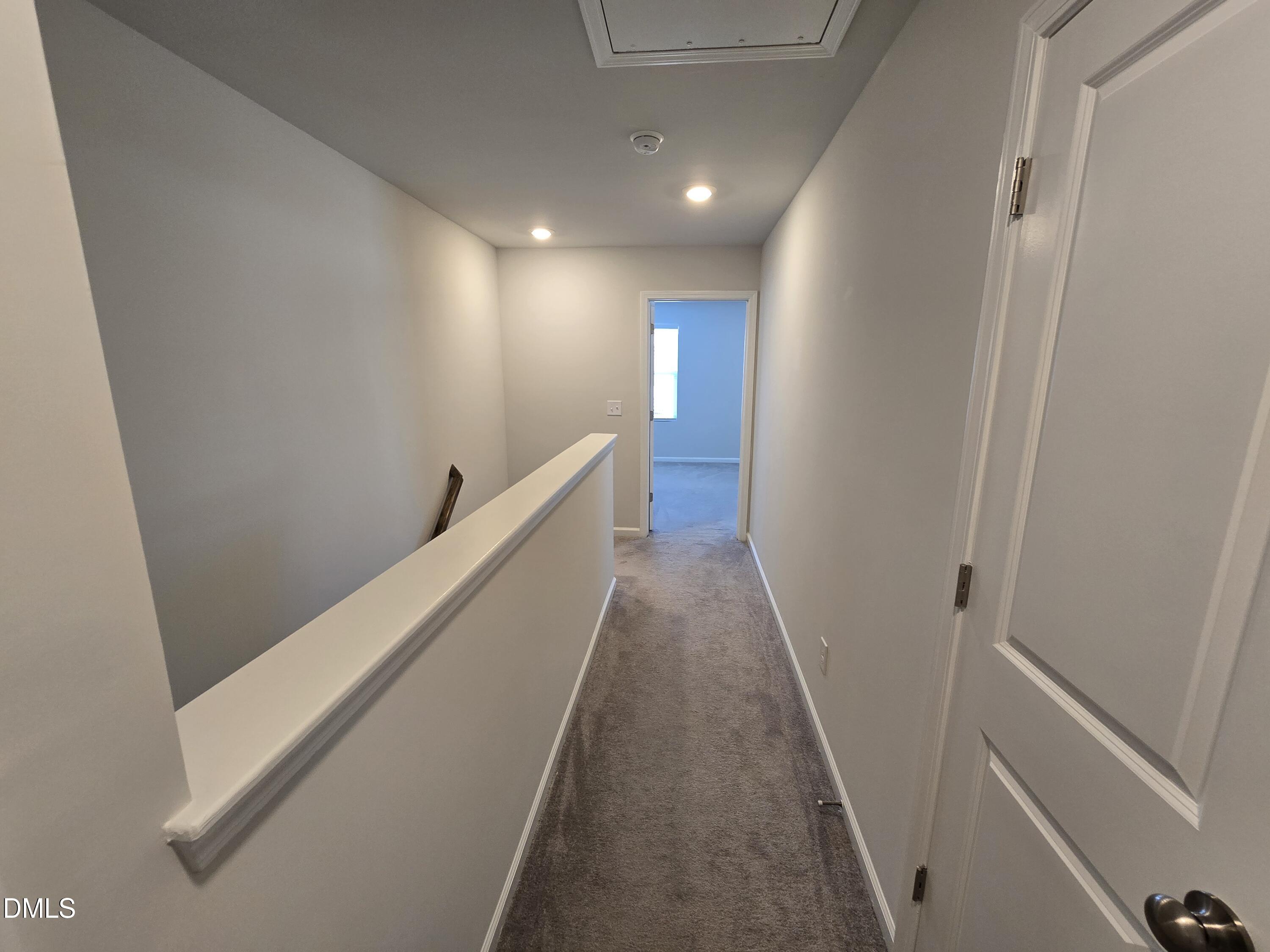 6309 Truxton Lane Raleigh, NC 27616 - Photo 36 of 41 a view of hallway with stairs