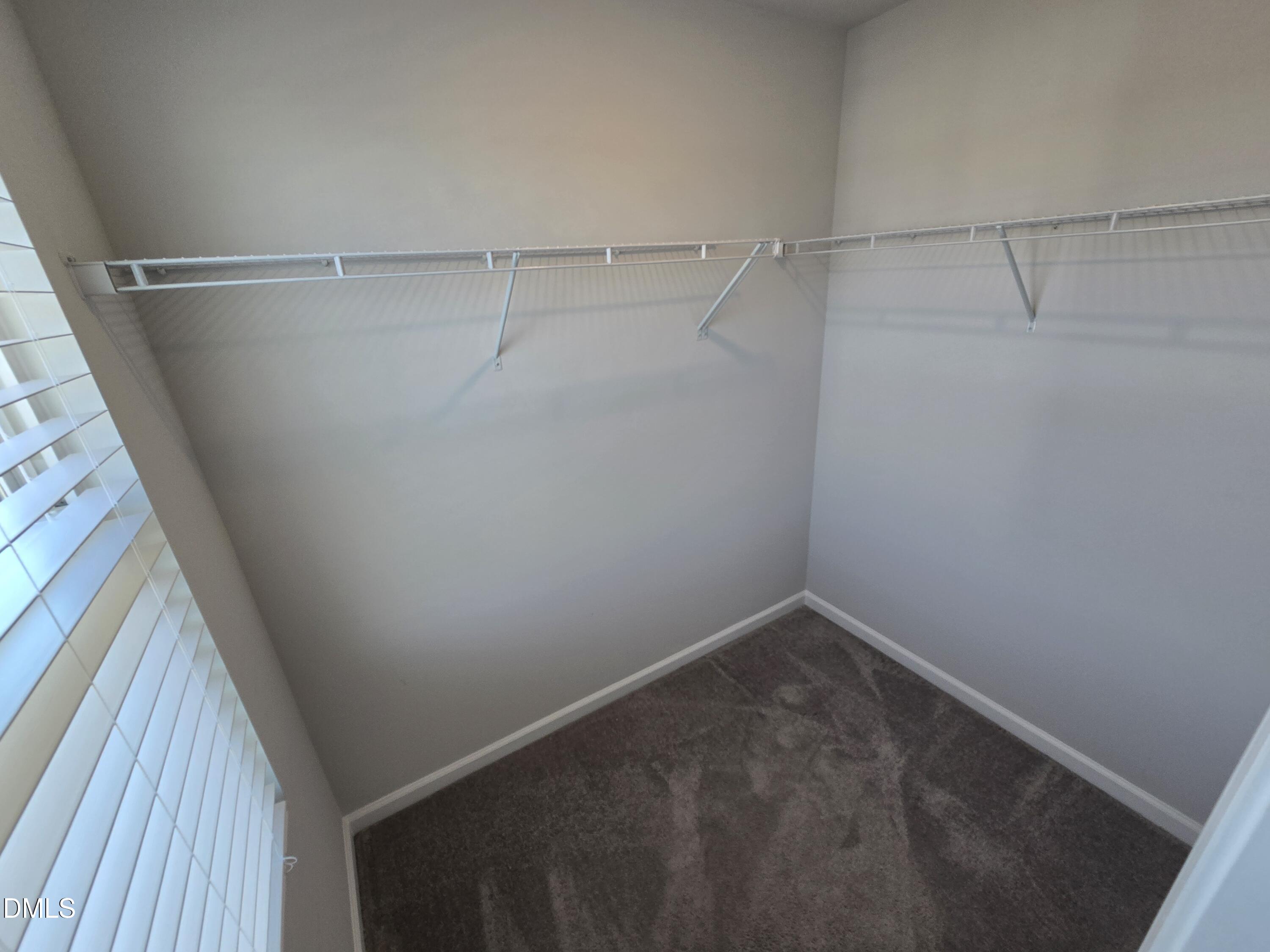 6309 Truxton Lane Raleigh, NC 27616 - Photo 40 of 41 a view of a room with racks on the wall
