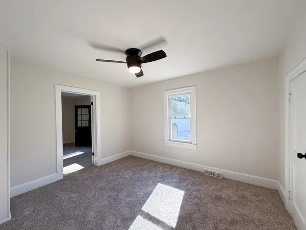 an empty room with windows