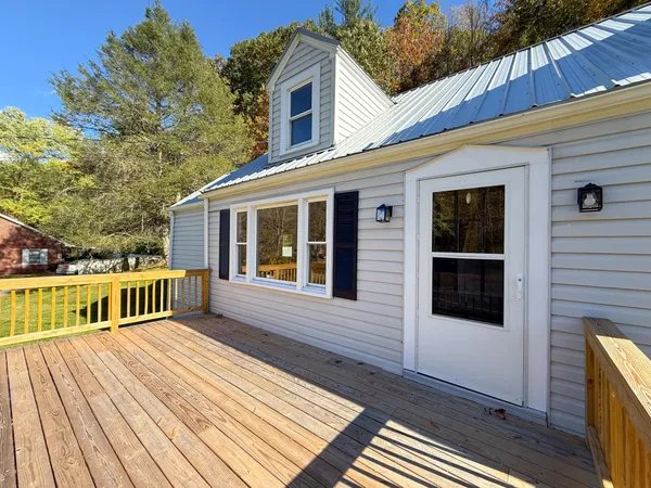 a view of a house with a deck