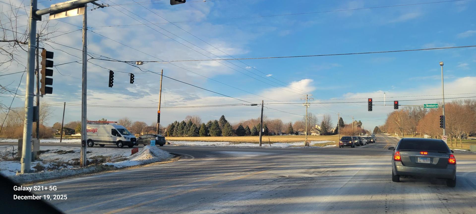 8155 Sayer Road Rockford, IL 61108 - Photo 2 of 5 a view of a city street with cars
