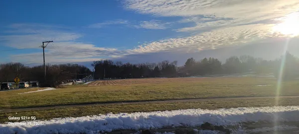 a view of a road with an ocean view