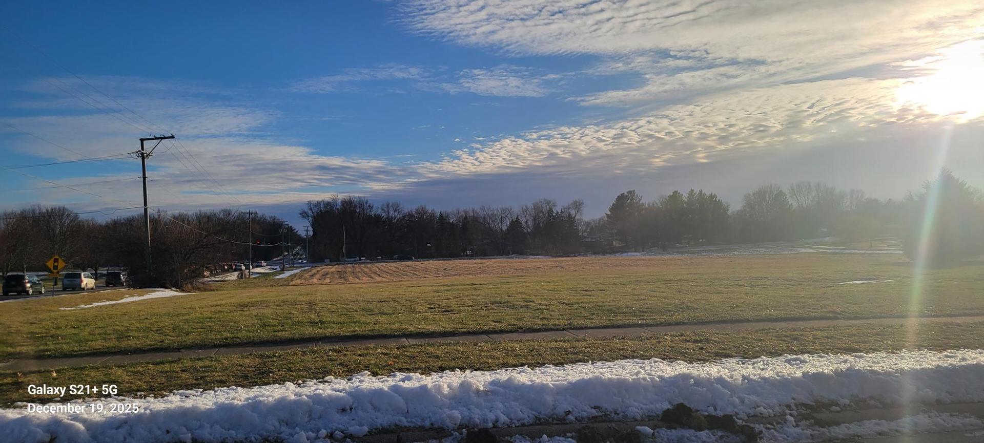 8155 Sayer Road Rockford, IL 61108 - Photo 3 of 5 a view of a road with an ocean view