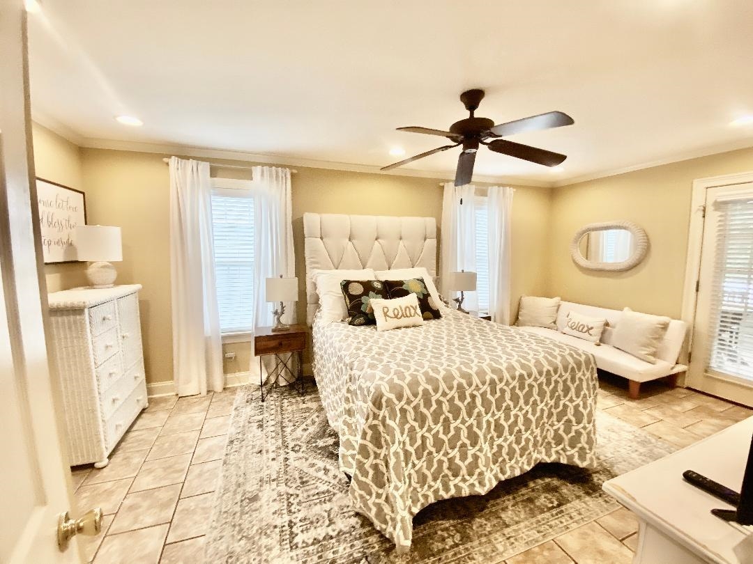 29 Frank Freeway Iuka, MS 38852 - Photo 17 of 31 a bedroom with a bed and wooden floor