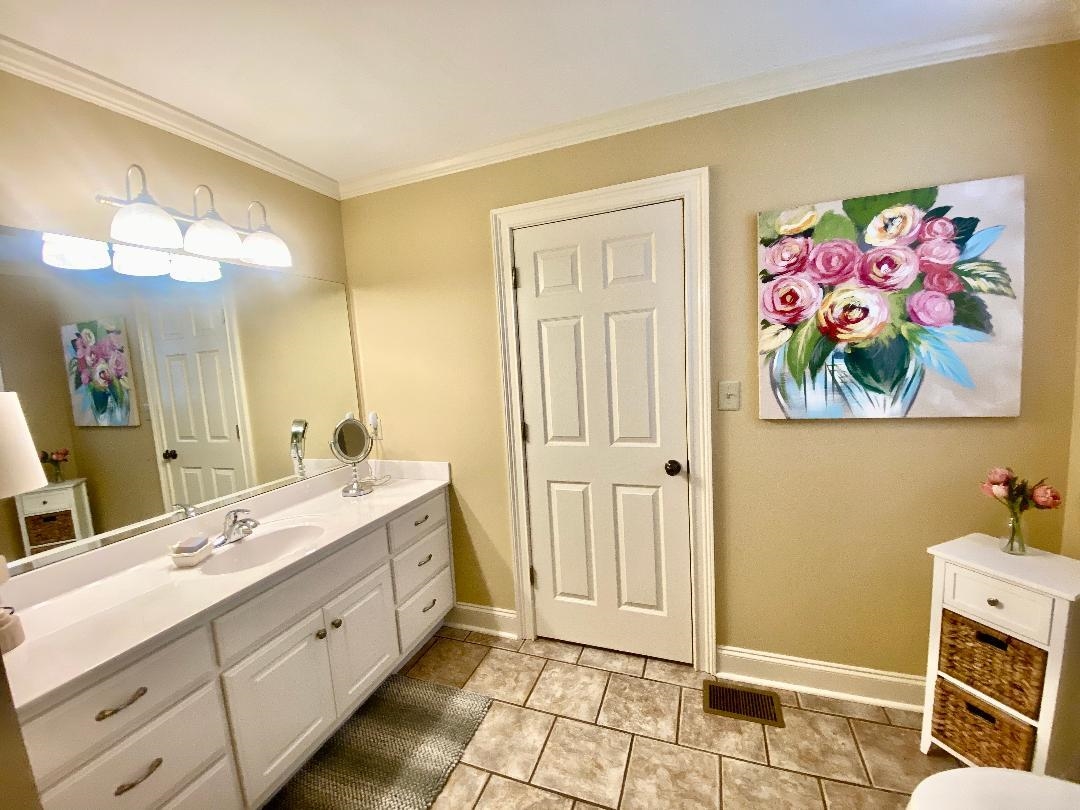 29 Frank Freeway Iuka, MS 38852 - Photo 18 of 31 a spacious bathroom with a double vanity sink and a mirror