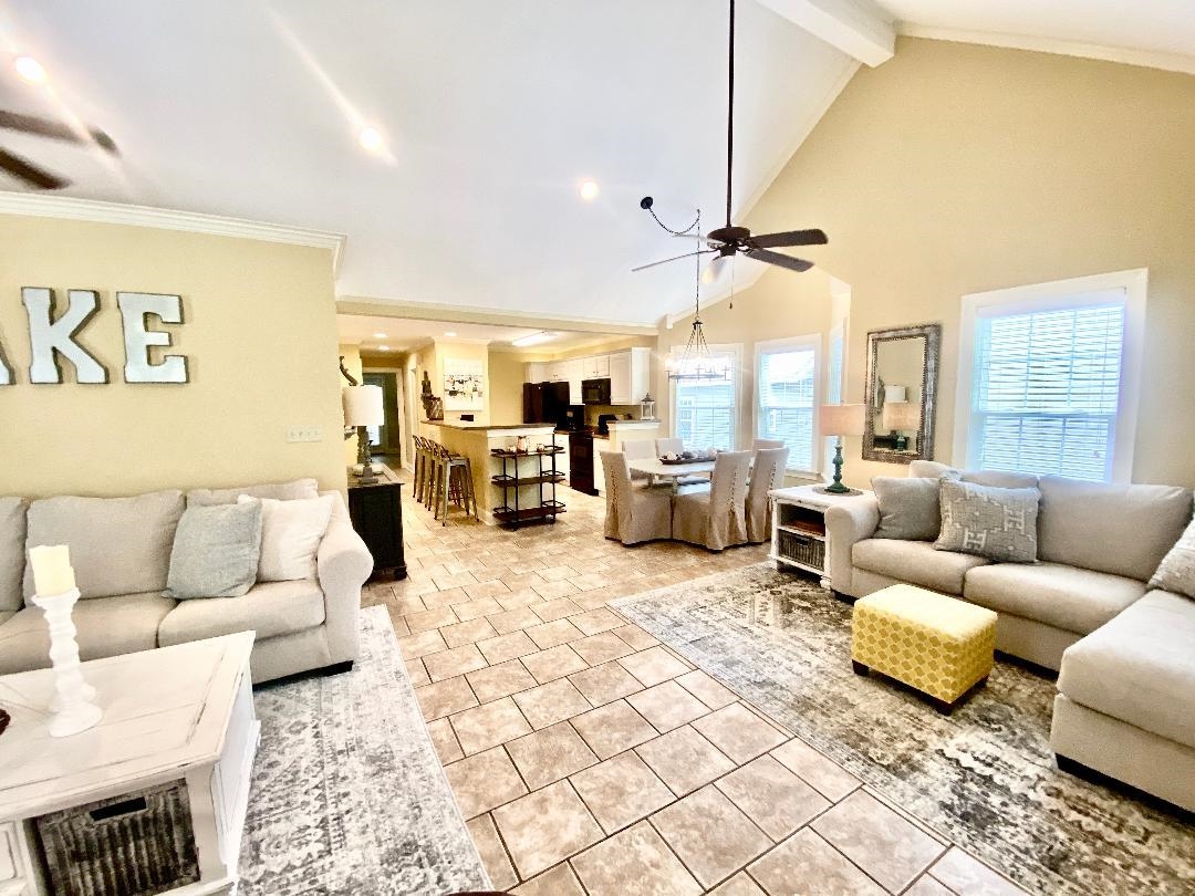 29 Frank Freeway Iuka, MS 38852 - Photo 10 of 31 a living room with furniture ceiling fan and a rug